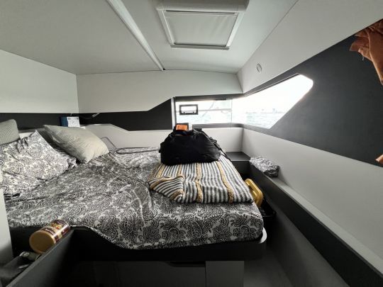 The main cabin benefits from a corner porthole