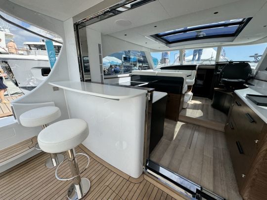 The rear window lowers to reveal a bar